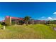 Landscaped backyard, providing a peaceful setting at 1780 Deborah Dr # 15, Punta Gorda, FL 33950