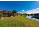 Community canal-front view from the backyard at 1780 Deborah Dr # 15, Punta Gorda, FL 33950