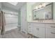 Updated bathroom with walk-in shower and white vanity at 1780 Deborah Dr # 15, Punta Gorda, FL 33950