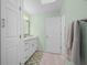 Bathroom with a vanity, toilet, and access to bedroom at 1780 Deborah Dr # 15, Punta Gorda, FL 33950