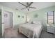 Light and airy bedroom with queen bed and access to bathroom at 1780 Deborah Dr # 15, Punta Gorda, FL 33950