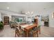 Bright dining area with hardwood floors, and view into the living room and kitchen at 1780 Deborah Dr # 15, Punta Gorda, FL 33950