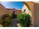 Pathway to the front door, with lush landscaping at 1780 Deborah Dr # 15, Punta Gorda, FL 33950