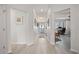 Long hallway with light walls and wood-look flooring at 1780 Deborah Dr # 15, Punta Gorda, FL 33950