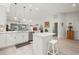 Bright kitchen with white cabinets, island, and stainless steel appliances at 1780 Deborah Dr # 15, Punta Gorda, FL 33950