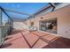 Relaxing screened patio with brick pavers and lounge chairs at 1780 Deborah Dr # 15, Punta Gorda, FL 33950