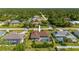 Aerial view of single-Gathering home with pool and fenced backyard at 18147 Cadillac Ave, Port Charlotte, FL 33948