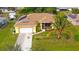 Aerial view of the house, showing the layout and pool at 18204 Ackerman Ave, Port Charlotte, FL 33948