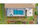 Overhead view of house with pool and solar panels at 18204 Ackerman Ave, Port Charlotte, FL 33948