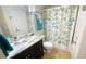 Bathroom with shower, toilet and granite vanity at 18204 Ackerman Ave, Port Charlotte, FL 33948