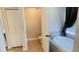 Bathroom with garden tub, walk-in shower, and toilet at 18204 Ackerman Ave, Port Charlotte, FL 33948