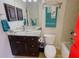 Bathroom with vanity and toilet at 18204 Ackerman Ave, Port Charlotte, FL 33948
