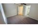Spacious bedroom with carpet, ceiling fan, and closet at 18204 Ackerman Ave, Port Charlotte, FL 33948