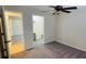 Bedroom with private bathroom access and walk-in closet at 18204 Ackerman Ave, Port Charlotte, FL 33948