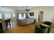 Bright and airy living room with wood floors and pool view at 18204 Ackerman Ave, Port Charlotte, FL 33948