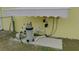 Pool pump and filter system under a protective awning at 18204 Ackerman Ave, Port Charlotte, FL 33948