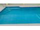 Clear blue swimming pool with steps for easy access at 18204 Ackerman Ave, Port Charlotte, FL 33948