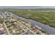 An aerial view shows the property's waterfront location and neighborhood at 18794 Ayrshire Cir, Port Charlotte, FL 33948