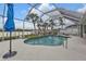 Screened pool area with canal views at 18794 Ayrshire Cir, Port Charlotte, FL 33948