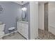 Spa-like bathroom with double vanity and walk-in shower at 226 Spring Lake Nw Blvd, Port Charlotte, FL 33952