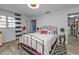 Well-lit bedroom with ensuite access to bathroom at 226 Spring Lake Nw Blvd, Port Charlotte, FL 33952