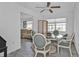 Open dining area with table, chairs, and view into living room at 226 Spring Lake Nw Blvd, Port Charlotte, FL 33952