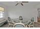Bright dining room with glass-top table and four chairs at 226 Spring Lake Nw Blvd, Port Charlotte, FL 33952