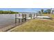 Wooden dock offering direct water access at 226 Spring Lake Nw Blvd, Port Charlotte, FL 33952