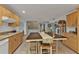 Kitchen with light wood cabinets and a large island at 226 Spring Lake Nw Blvd, Port Charlotte, FL 33952