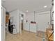 Laundry room with washer, dryer, and storage at 226 Spring Lake Nw Blvd, Port Charlotte, FL 33952