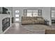 Living room features a fireplace, tile floors and large windows at 226 Spring Lake Nw Blvd, Port Charlotte, FL 33952