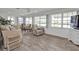 Bright living room with water views and comfy seating at 226 Spring Lake Nw Blvd, Port Charlotte, FL 33952