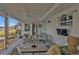 Screened porch with water views and comfortable seating at 226 Spring Lake Nw Blvd, Port Charlotte, FL 33952