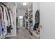 Spacious walk-in closet with ample shelving and hanging space at 226 Spring Lake Nw Blvd, Port Charlotte, FL 33952