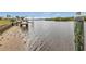 Peaceful waterfront view with sandy shore at 226 Spring Lake Nw Blvd, Port Charlotte, FL 33952