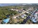 Aerial view showcasing home's waterfront location and surrounding community at 2824 Caribbean Dr, Punta Gorda, FL 33950