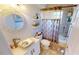 Updated bathroom with a walk-in shower and modern fixtures at 2824 Caribbean Dr, Punta Gorda, FL 33950