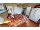 Bedroom with hardwood floors, a queen-size bed, and built-in storage at 2824 Caribbean Dr, Punta Gorda, FL 33950