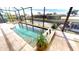 Heated pool and spa with tranquil water feature at 2824 Caribbean Dr, Punta Gorda, FL 33950