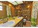Updated bathroom with double vanity and tiled shower at 3114 Magdalina Dr, Punta Gorda, FL 33950