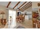 Open dining area with wood table and chairs, adjacent to kitchen at 3114 Magdalina Dr, Punta Gorda, FL 33950