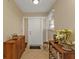 Bright entryway with tile floors and built-in storage at 3114 Magdalina Dr, Punta Gorda, FL 33950