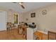 Home office features built-in shelving and hardwood floors at 3114 Magdalina Dr, Punta Gorda, FL 33950