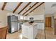 Modern kitchen with white cabinets and stainless steel appliances at 3114 Magdalina Dr, Punta Gorda, FL 33950