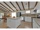 Modern kitchen with white cabinets and stainless steel appliances at 3114 Magdalina Dr, Punta Gorda, FL 33950