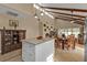 Bright kitchen with white cabinets, stainless steel appliances, and an island at 3114 Magdalina Dr, Punta Gorda, FL 33950