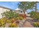 Brick pathway leading to the house entrance at 3114 Magdalina Dr, Punta Gorda, FL 33950