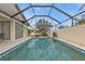 Inviting screened pool area with patio furniture at 3114 Magdalina Dr, Punta Gorda, FL 33950