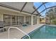 Enjoyable pool area with patio and grill at 3114 Magdalina Dr, Punta Gorda, FL 33950