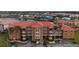 Aerial view of La Rosanna, a condo building with a pool and waterfront access at 3322 Purple Martin Dr # 126, Punta Gorda, FL 33950